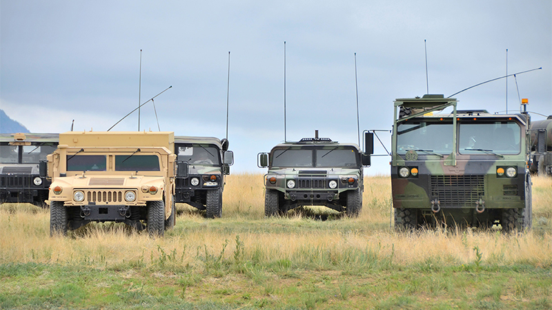 Military Convoy Showing Vehicle Antennas