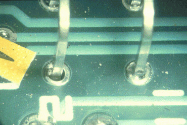 Figure 3: The solder has not fully filled the plated through hole on the left