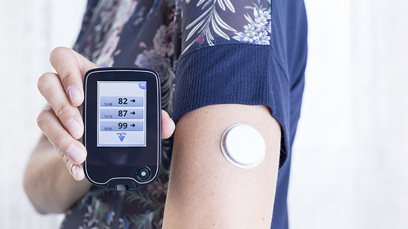 Example of a wearable medical device for glucose monitoring system.